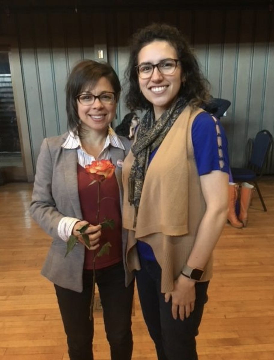Dr. Diana Peña and Liliana Iglesias posing at a leader award celebration.