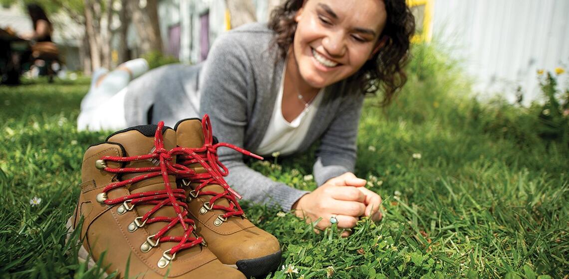 Arlyn Moreno Luna’s boots represent both a favorite activity — hiking — and the privilege of being able to pursue higher educati