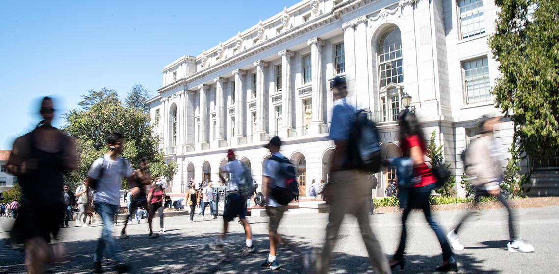 Students walking in front of Wheeler Hall