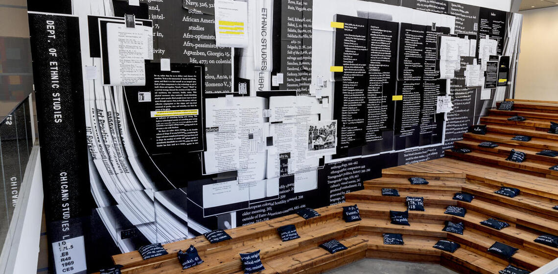 A photo of Stephanie Syjuco's installation of "Present Tense (Roll Call)" at BAMPFA.