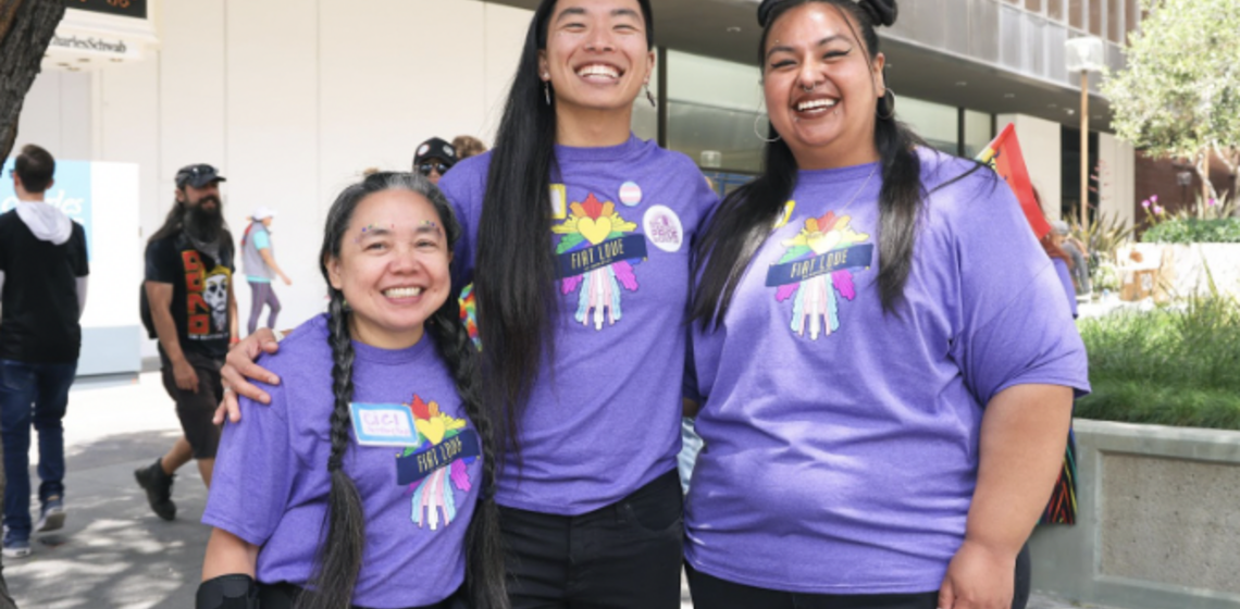 3 people smiling at the cal pride parade