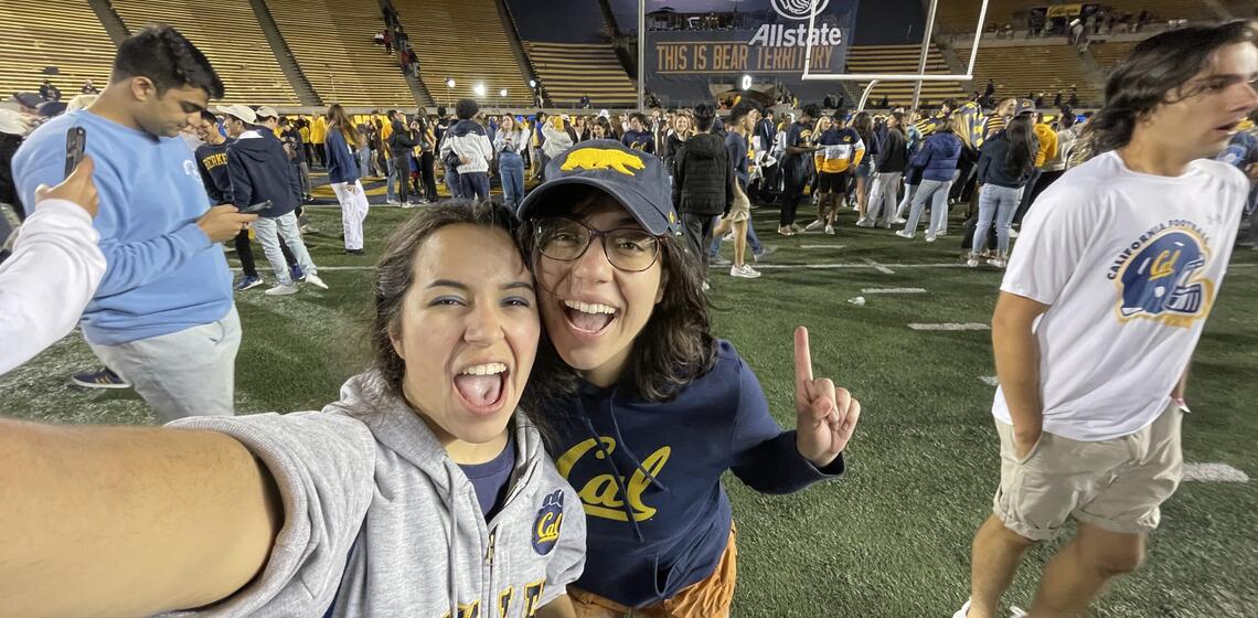 Recent graduates rocking school spirit at a Cal football game.